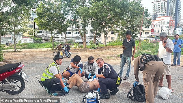 Andrew Joseph Cook, 36, from Manchester (pictured) was reportedly with two other foreigners and a Thai woman in a white Toyota Veloz that pulled over in a car park in Pattaya, Thailand , on Friday evening