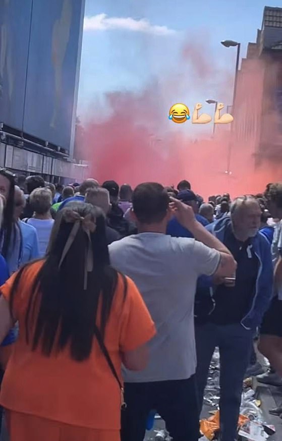 But a huge cloud of red also appeared — and it is believed that Liverpool fans were behind it