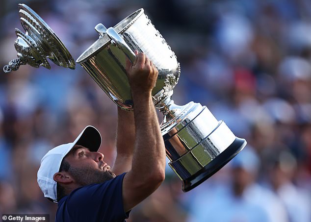 The lid of the Wanamaker Trophy fell off during Scottie Scheffler's celebrations on Sunday