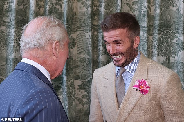 David Beckham was spotted wearing the new 'King's Rose' pinned to his blazer during the meeting