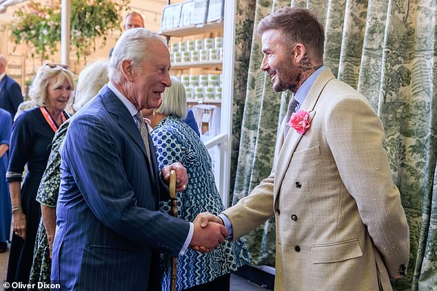The pair shared a firm handshake as they greeted each other at the 2025 event