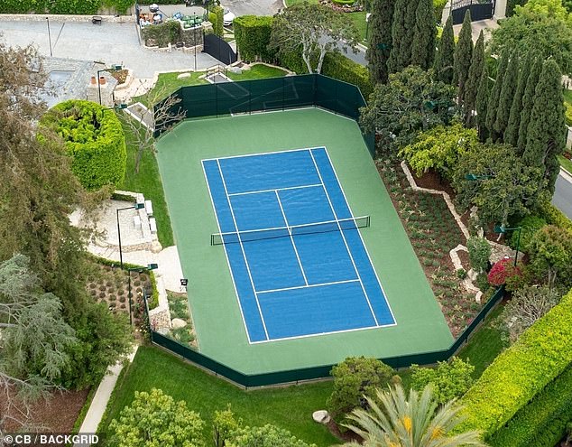 A colorful tennis court is one of the property's unique luxury features