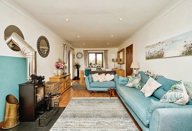 South East England, £500k: The heart of the home is a magnificent 24ft 6' lounge/diner