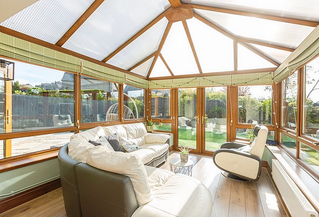 Wales, £600k: It also has a conservatory/dining room, and snug/study - alongside a kitchen