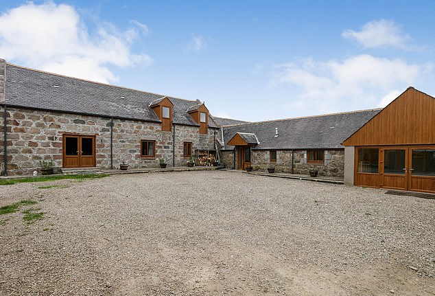 Scotland, £500k: The exterior is equally impressive, with a stone chip courtyard to the front