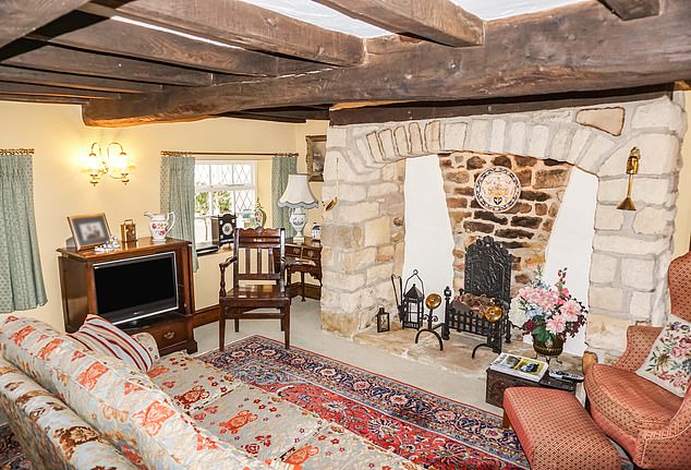 Yorkshire and The Humber, £500k: there is a detached double garage accessed via a bridge