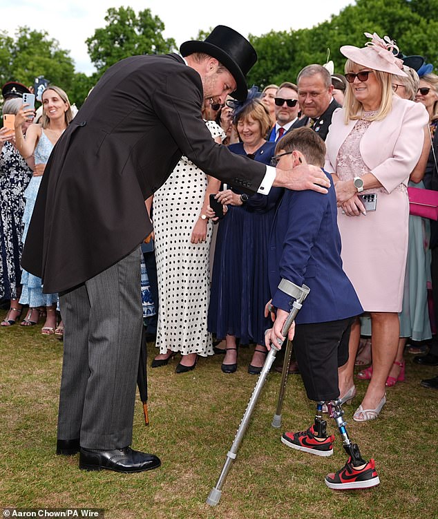 Tony, accompanied by his mother Paula, was greeted by Prince William at the party