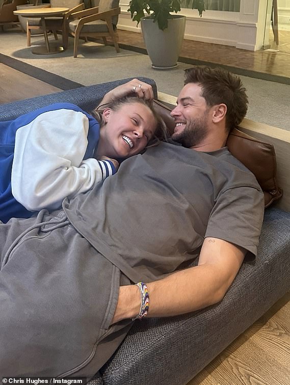 JoJo Siwa and Chris Hughes have sparked speculation that they have confirmed their relationship after cuddling up to one another in some very cosy snaps