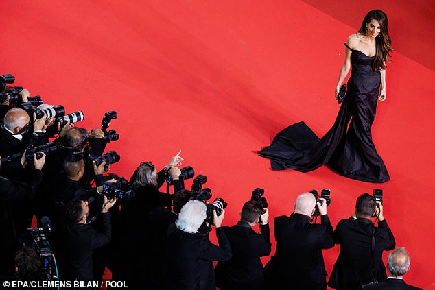 Last Saturday, the 47-year-old human rights lawyer daringly broke the Cannes Film Festival dress code by donning a black archival John Galliano gown for Christian Dior featuring a since-banned train