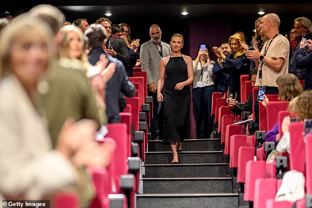The movie, directed by Scarlett, premiered to great praise at the festival (pictured) as it received a five-minute standing ovation and prompted 'tears and cheers' from the crowds