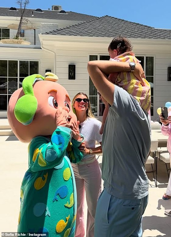To mark the occasion, Sofia threw a backyard party complete with little pink toddler-sized tents, a bounce house, a tiered cake and even an adult dressed as a baby