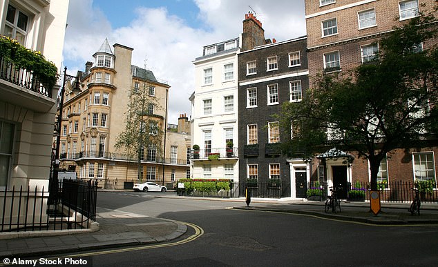 In Mayfair streets seem eerily devoid of communities, with one lone car parked on this junction