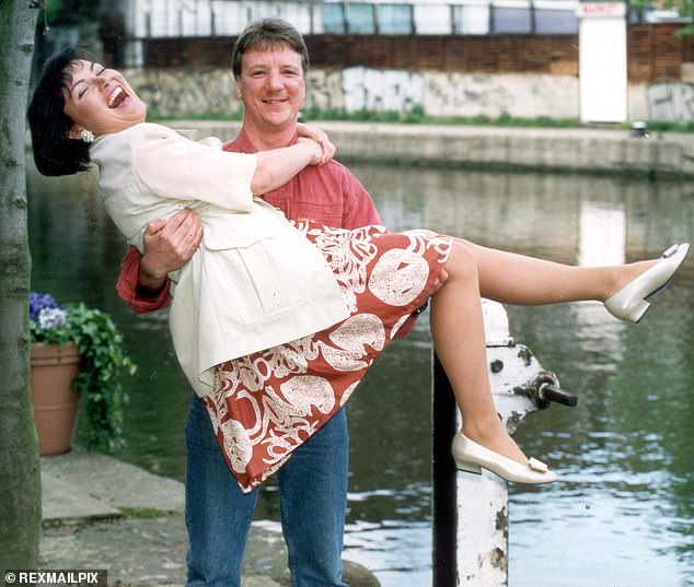 Lorraine's show has also been slashed in half, now running for just 30 minutes from 9:30am to 10am. As such, the host will now have more time on her hands to spend with her beloved husband of more than 32 years (pictured in 1992)