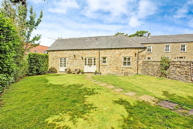 North East England, £600k: The property has a kitchen with built-in appliances