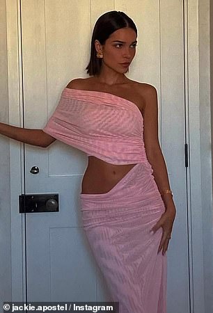 Last week, Jackie slipped into an eye-catching pink cut-out dress