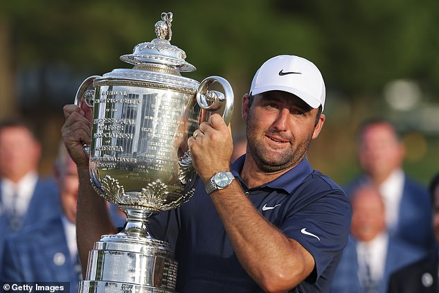 Scottie Scheffler holds the Wanamaker Trophy aloft after his US PGA triumph last Sunday