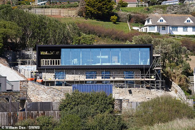 New pictures show the two-year-long construction of Cate Blanchett's five-bed luxury eco home in the seaside village of Mawgan Porth is gradually nearing completion