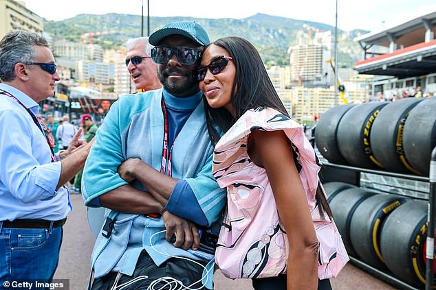 Naomi was also seen with close friend will.i.am on the grid before qualifying commenced