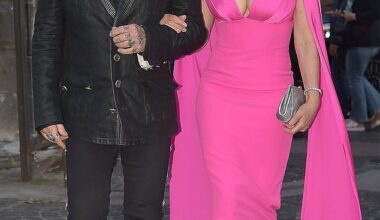 Elizabeth Hurley, 59, and Billy Ray Cyrus, 63, put on a loved up display as they made their first public outing as a couple at a Valentino bash in Rome on Saturday evening