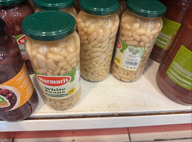 When our reporter visited there was dirt packed into the crevices beside jars of food