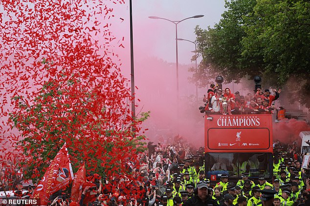 Confetti fell from the air as the bus was marshalled the bus through the 10-mile route