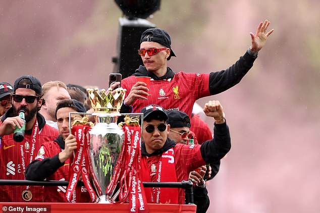 The Premier League trophy was front and centre of the bus, held by Diogo Jota at one point