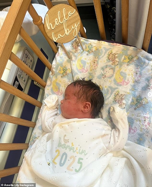 The singer took to Instagram to share the news, uploading a slew of snaps with her newborn daughter and admitting she had gone though 'rough times'