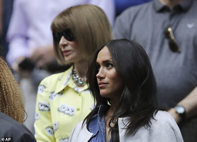 Meghan with Anna Wintour behind her at the 2019 US Open. According to a source Anna banned Meghan from the cover once she got wind of her demands