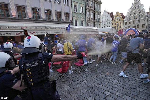 Police in Poland seemingly used pepper spray during a clash with Chelsea and Real Betis fans