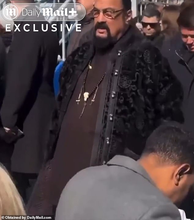 A ballooned 400lb Steven Seagal was seen strutting his distended tummy through crowds at Moscow 's famous Red Square to show support for his beloved Russia