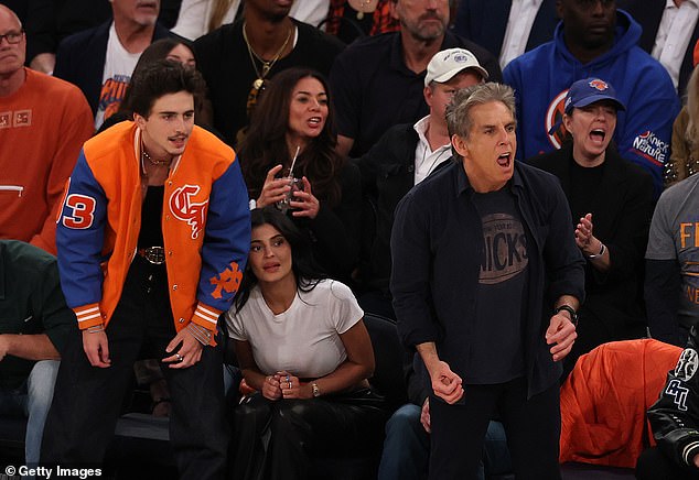The star-studded front row included Ben Stiller, who got on his feet along with Timothee during a tense part of the game