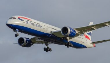 A British Airways cabin crew member was arrested after being found 'dancing high and naked' in a business class bathroom