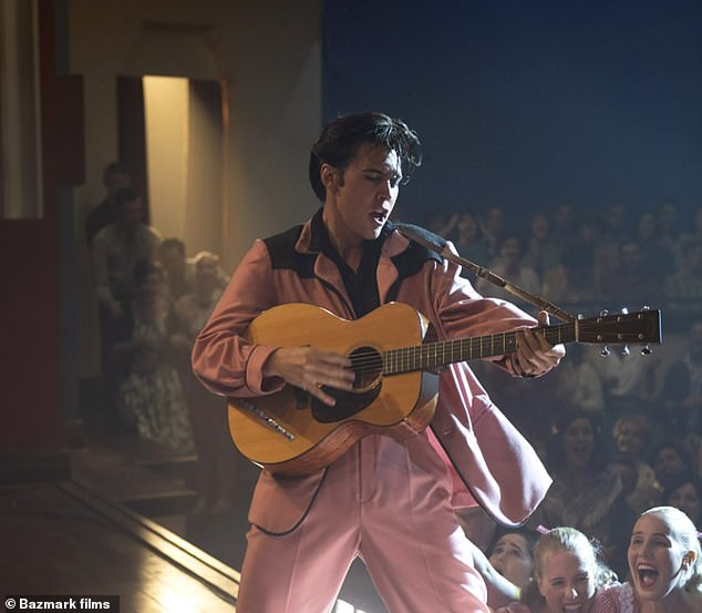 The Oscar-nominated director shared a post to social media on Friday revealing he would soon be screening a new Elvis Presley documentary, featuring never-before-seen footage of the late singer. Pictured: Austin Butler as Elvis in Baz's movie