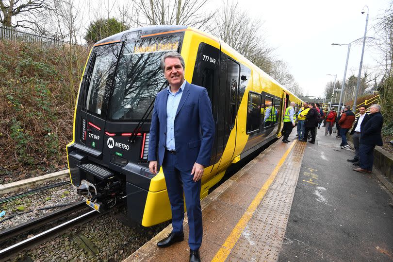 Steve Rotheram,Metro Mayor of the Liverpool City Region,with the new Merseyrail train at Kirkby Station.(Pic Andrew Teebay).