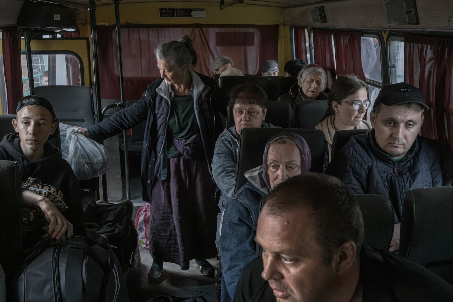 Ukrainians who fled Russian-occupied areas are transported to a center for displaced people, in Sumy, Ukraine, April 28, 2024.