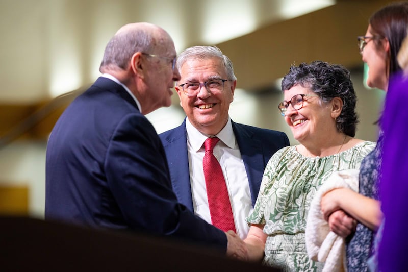 Elder Quentin L. Cook of the Quorum of the Twelve Apostles greets attendees of a multi-stake conference held in Birmingham, England on Sunday, May 25, 2025.