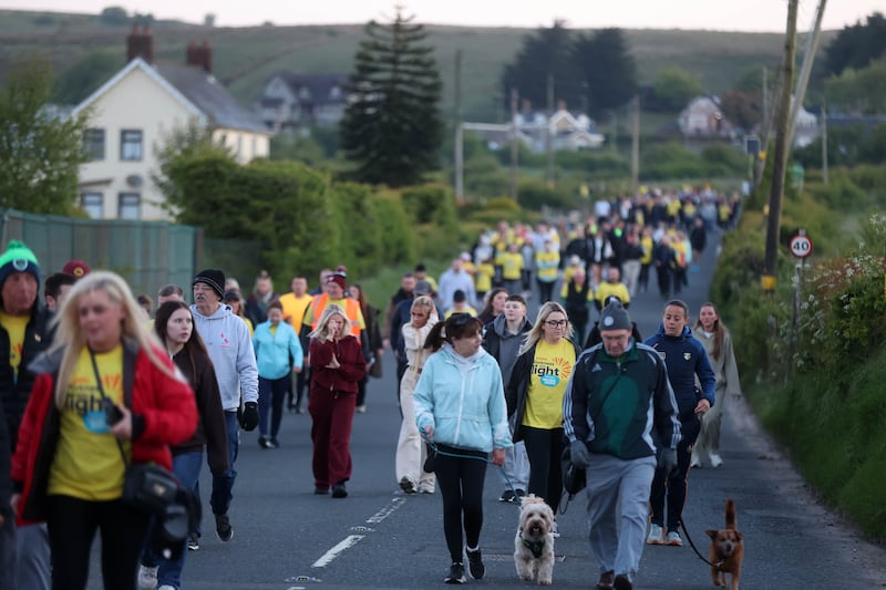 The annual Darkness into Light walk from Lámh Dhearg GAC in west Belfast, bringing together individuals, families, and communities to raise awareness and support for those affected by suicide and mental health issues. PICTURE: MAL MCCANN