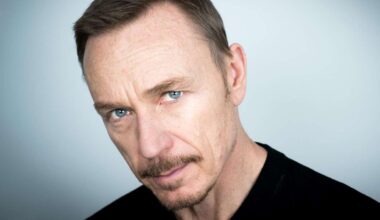 Headshot of actor Ben Daniels