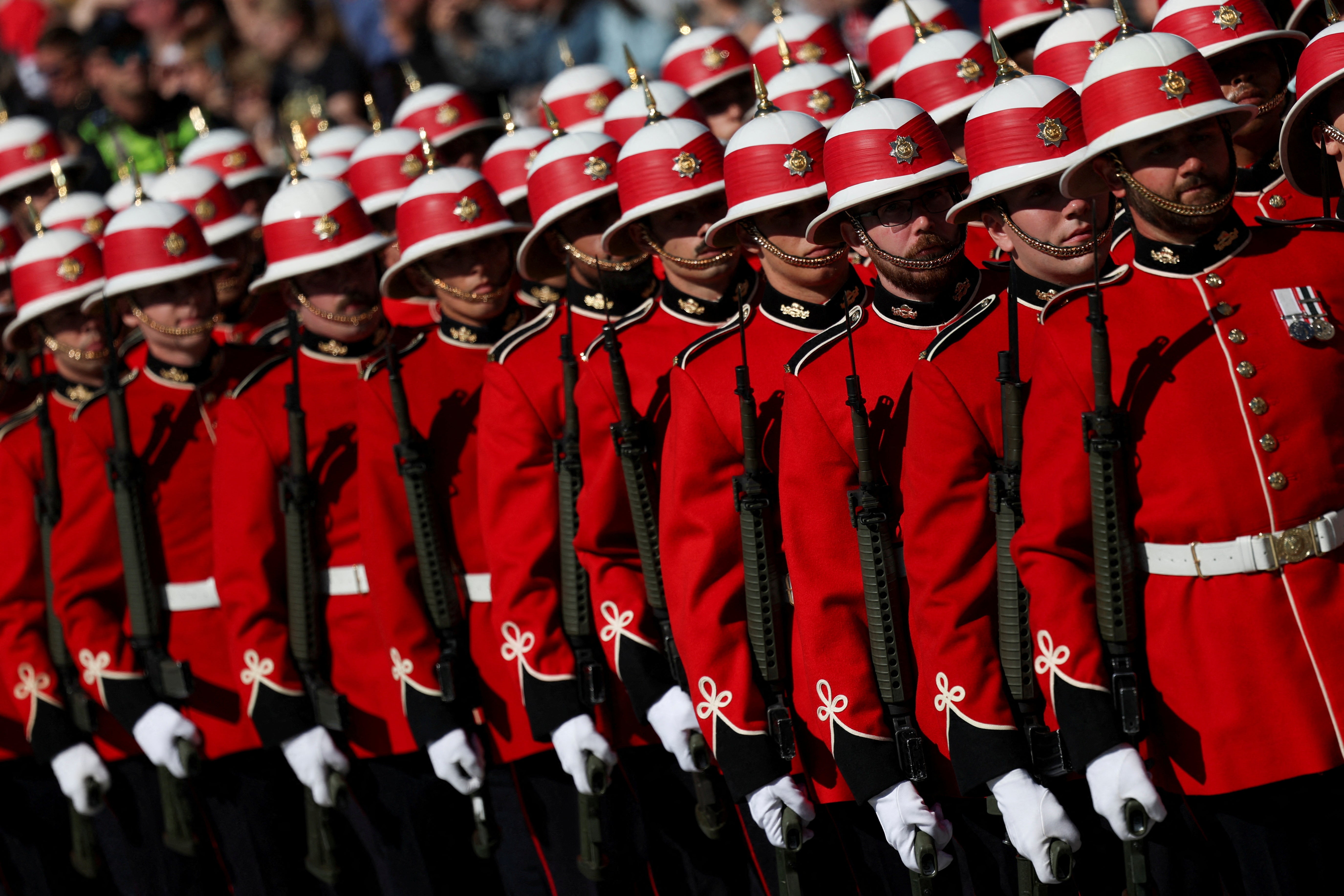 Members of the guard of honour gather, on the day Britain's King Charles and Queen Camilla visit
