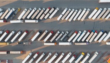 a birds-eye view of a series of parked trucks
