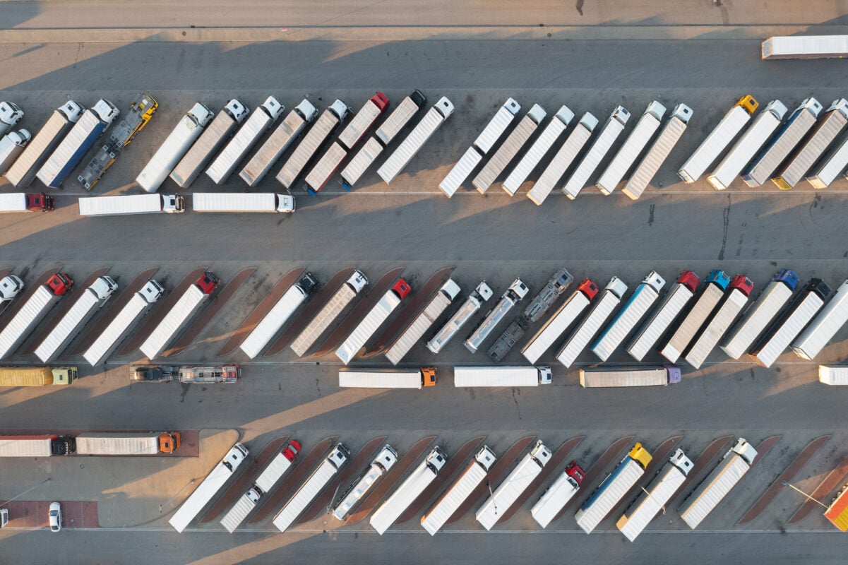 a birds-eye view of a series of parked trucks
