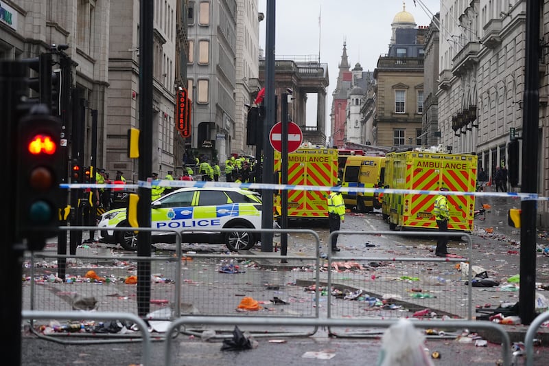 Police and emergency personnel dealing with an incident near the Liver Building in Liverpool during the Premier League winners parade. Photograph: Owen Humphreys/PA Wire 