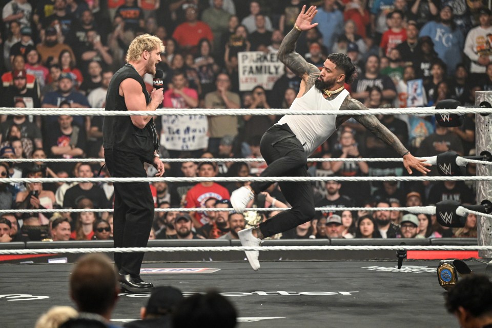KANSAS CITY, MISSOURI - APRIL 28: Jey Uso with a kick to Logan Paul during Monday Night RAW at T-Mobile Center on April 28, 2025 in Kansas City, Missouri. (Photo by Michael Marques/WWE via Getty Images)