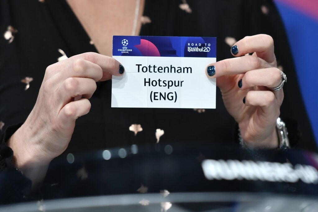 UEFA Champions League ambassador Kelly Smith holds the slip of Tottenham Hotspur during the UEFA Champions League football cup round of 16 draw cer...