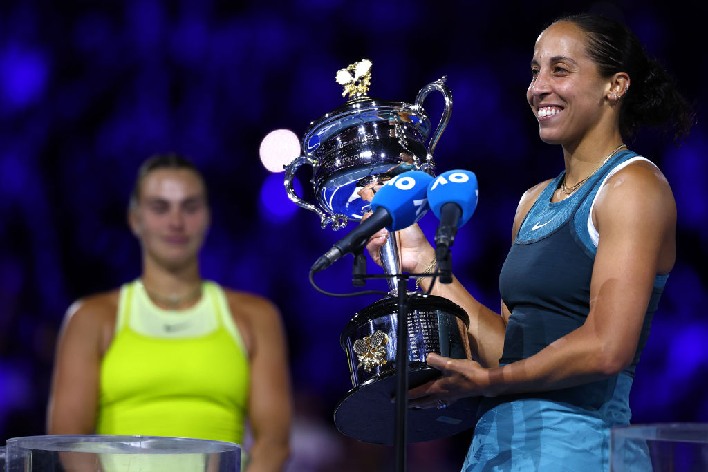 Madison Keys poses with the Australian Open title after beating Aryna Sabalenka in the 2025 final