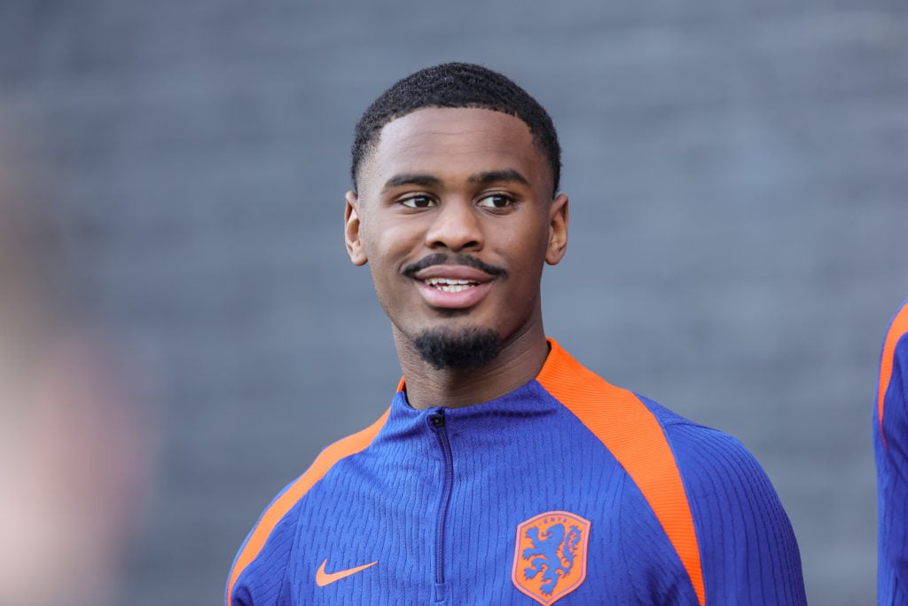 Jorrel Hato smiles during training with the Netherlands.