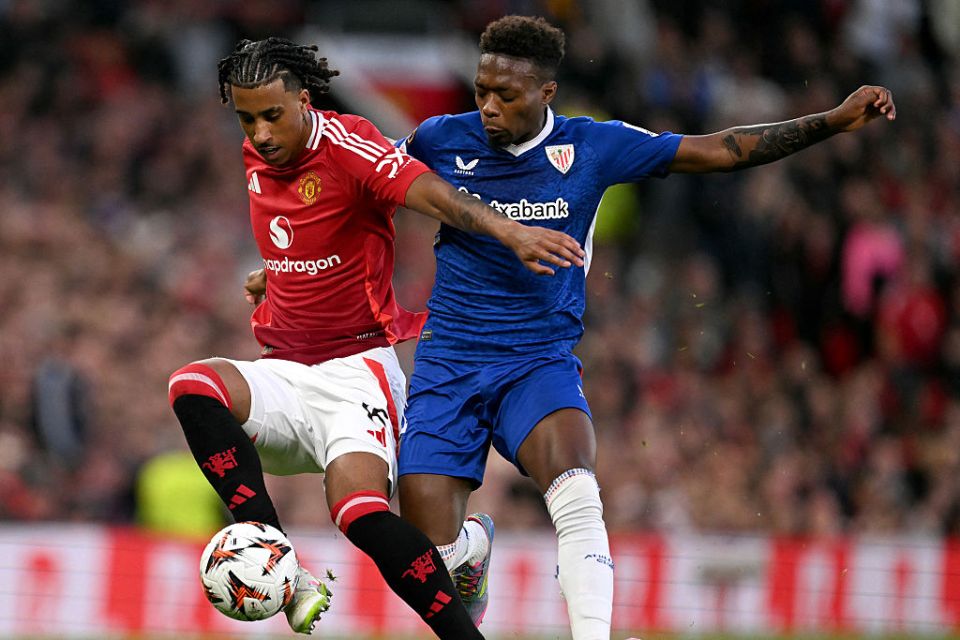 Manchester United's French defender #15 Leny Yoro (L) and Athletic Bilbao's Spanish midfielder #11 Alvaro Djalo (R) fight for the ball during the UEFA Europa League semi final second leg football match between Manchester United and Athletic Club Bilbao at Old Trafford stadium in Manchester, north west England, on May 8, 2025. (Photo by Oli SCARFF / AFP) (Photo by OLI SCARFF/AFP via Getty Images)