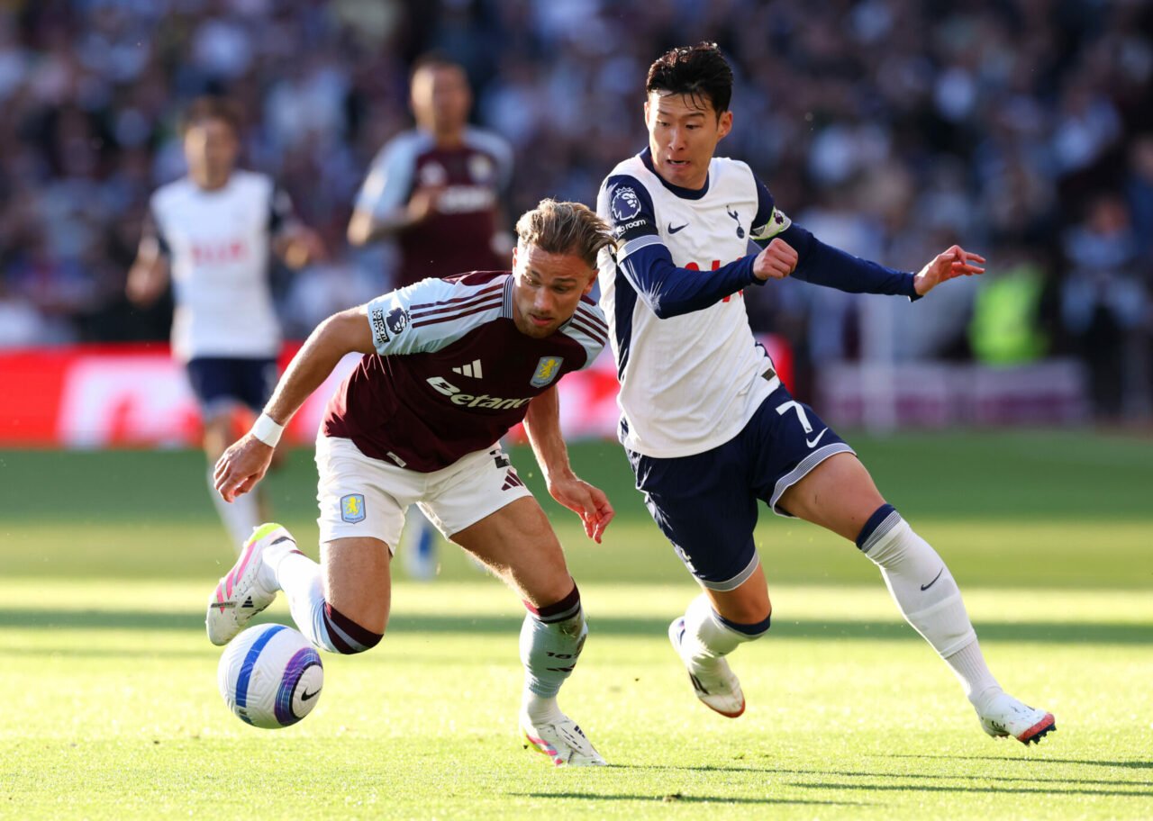 Matty Cash of Aston Villa is challenged by Son Heung-Min of Tottenham Hotspur during the Premier League match between Aston Villa FC and Tottenham ...