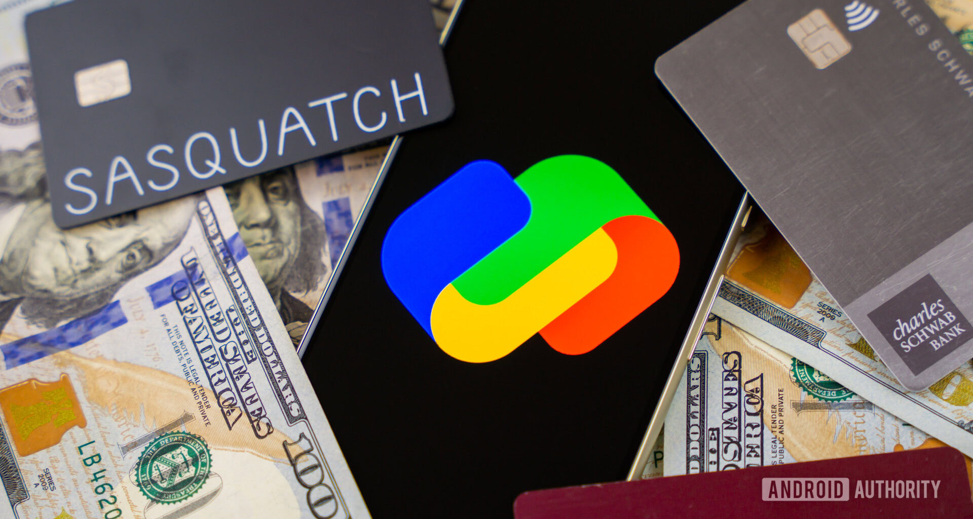 Google Pay logo on smartphone next to money and cards Stock photo 3