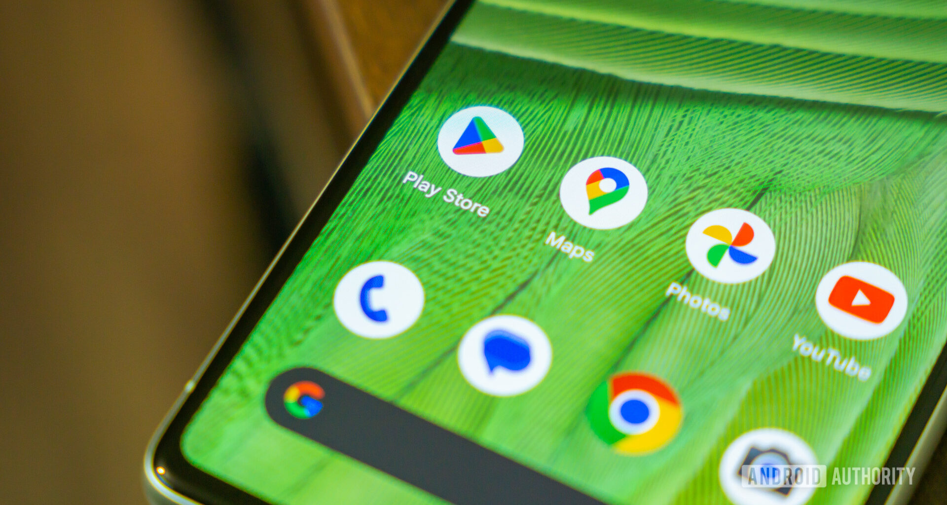Google Play Store app next to other Google Apps stock photo